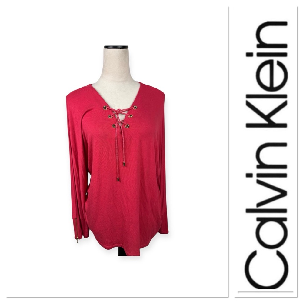 Calvin Klein red top with ties on top and zippers on sleeves size XL